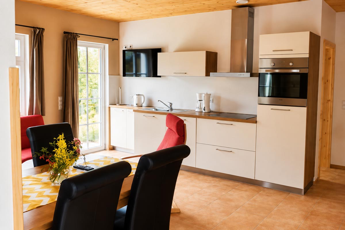 Ferienwohnung Winterstein – Wohnküche Ferienhaus Winterbergblick in Hinterhermsdorf - Ferienwohnung Winterstein - Wohnküche mit Esstisch